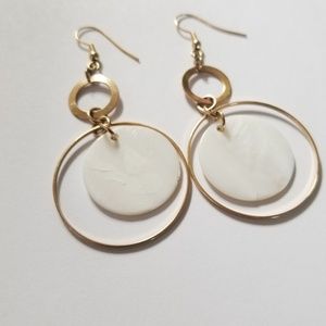 Gold and white earrings
